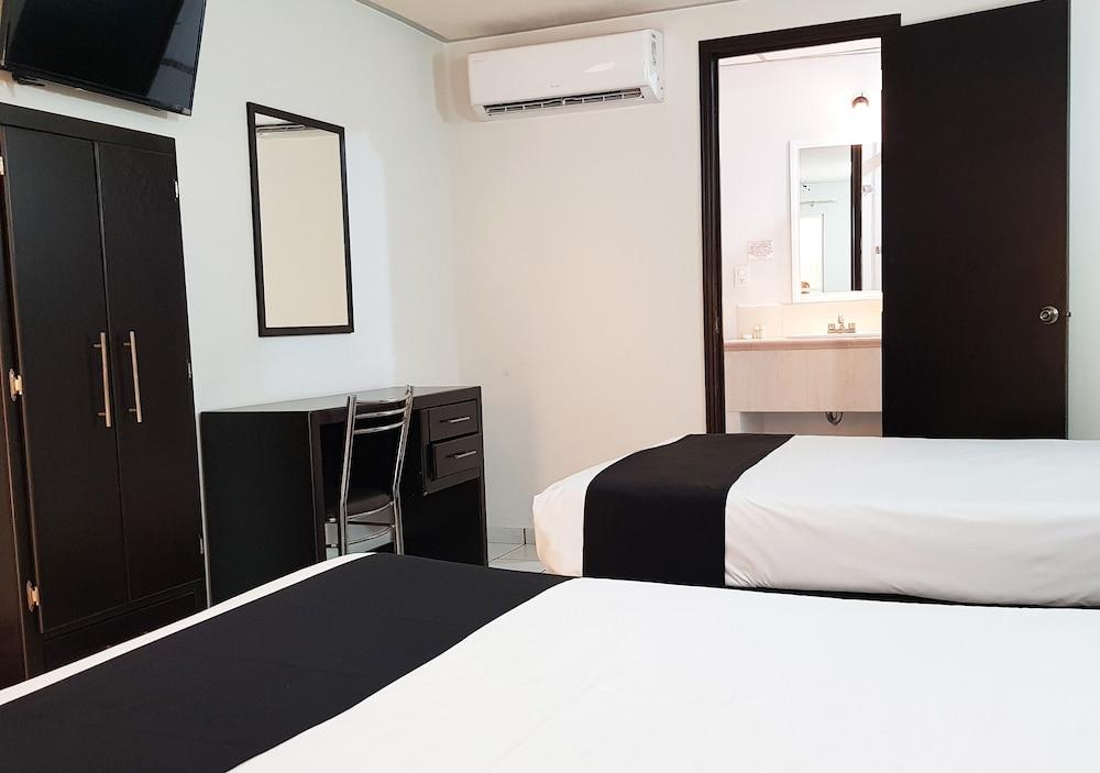 Capital O Hotel Victoria Морелия Екстериор снимка