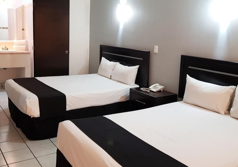 Capital O Hotel Victoria Морелия Екстериор снимка